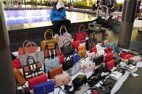 is it illegal to own a fake designer bag|selling counterfeit designer bags.